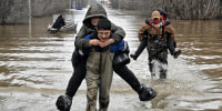 Rescuers evacuate residents from the floodwaters in Orsk, Russia,  on April 8, 2024.