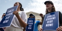 Student loan borrowers rally outside the Supreme Court in Washington