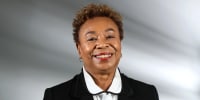 Rep Barbara Lee smiles while posing for a portrait