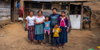 Reina Coronado, second from left, with her family in Comitancillo, Guatemala