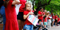 Children participate in a demonstration in support of gun control laws