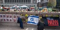 People set up a makeshift memorial for the Israeli hostages held by Hamas next to the "Gaza Solidarity Encampment" at Columbia University on April 23, 2024 in New York.