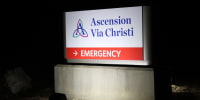 A sign for Ascension Via Christi hospital emergency services