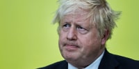 Boris Johnson, who brought in UK voter ID rules, is turned away from polling station after forgetting his