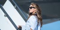 Hope Hicks boards Air Force One