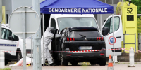 A forensic investigator at the site of a ramming attack in France