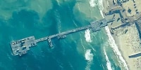 The temporary pier is part of the Joint Logistics Over-the-Shore capability. The U.S. military finished installing the floating pier on Thursday, with officials poised to begin ferrying badly needed humanitarian aid into the enclave besieged over seven months of intense fighting in the Israel-Hamas war.