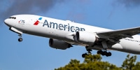 An American Airlines Boeing 777-223 takes off