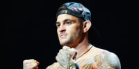 Dustin Poirier poses with two fists up