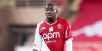 Mohamed Camara wearing jersey with a anti-homophobia badge  covered up on the field during a match between Monaco and Nantes