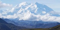 Two climbers awaited rescue near the peak of North America’s tallest mountain Wednesday, May 29, 2024, a day after they and a third climber in their team requested help after summiting Denali during the busiest time of the mountaineering season, officials at Denali National Park and Preserve said.