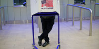 A voters casts their ballot in the 2020 presidential election in New York.