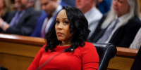 Fani Willis seated during a hearing in Atlanta