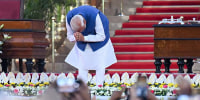 India's newly sworn-in Prime Minister Narendra Modi bows to the gathering after taking the oath of office at presidential palace Rashtrapati Bhavan in New Delhi on June 9, 2024.