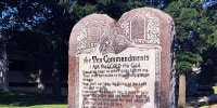 A 6-foot-tall Ten Commandments monument is seen on the Arkansas Capitol grounds in Little Rock.