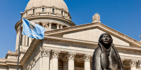 As Long as the Waters Flow statue by Allan Houser in front of the Oklahoma State Capitol building