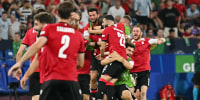 Image: FBL-EUROGeorgia erupts in celebration at surprise Euro 2024 success; Ukrainians eager for a wartime win lament elimination
2024-MATCH35-GEO-POR