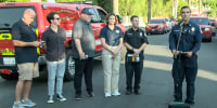 Captain Paul Seawright and other officials during a press conference outside