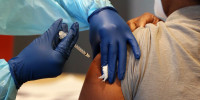 A person receives a Covid vaccine