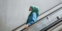 A masked commuter on the metro in Washington