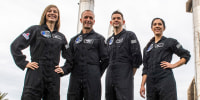 The SpaceX Polaris crew pose at the Starbase Complex in Boca Chica.