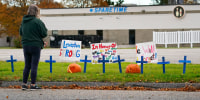 Makeshift memorial outside Sparetime Bowling Alley