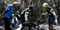 Rescuers scoured the Thai jungle August 23 for nine missing people after a turboprop plane crashed southeast of capital Bangkok, though authorities expected no survivors.