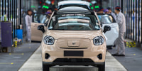 Cars rolling off the assembly line