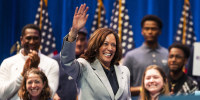 Kamala Harris walks and waves