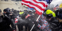 Rioters clash with police and security forces