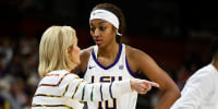 Head coach Kim Mulkey of the LSU Lady Tigers talks with Angel Reese #10 of the LSU Lady Tigers in the third quarter during the semifinals of the SEC Women's Basketball Tournament at Bon Secours Wellness Arena on March 09, 2024 in Greenville, South Carolina.  