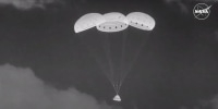 The Boeing Starliner capsule floats down to New Mexico.