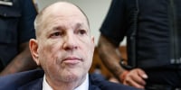 Harvey Weinstein sits in court