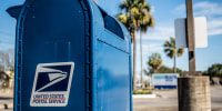 A U.S. Postal service mailbox on Feb. 10, 2022 in Houston.