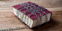 Book with chains wrapped around it