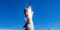 This handout photograph taken on September 25, 2024 and released by the Chinese People's Liberation Army News and Communication Center on September 26, 2024, shows the Chinese People's Liberation Army Rocket Force launching an intercontinental ballistic missile carrying a dummy warhead into the Pacific Ocean, at an undisclosed location. 