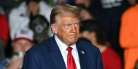 Former President Donald Trump arrives at a rally in Saginaw, Mich., on Oct. 3, 2024.