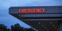 Hospital emergency room entrance sign.