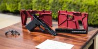 A ghost gun kit is displayed on a table outside