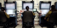 Israeli military soldiers in a new surveillance and situation room built after their previous base at Nahal Oz was overrun and destroyed in the October 7th attack.