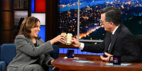 Kamala Harris and Stephen Colbert with beer