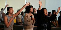 Parishioners pray during a service at the Christ Central Presbyterian Church on Oct. 13, 2024 in Centreville, Va.