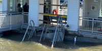 A portion of the gangway which collapsed Saturday afternoon remains visible on Sapelo Island in McIntosh county, Ga., Sunday, Oct. 20, 2024.