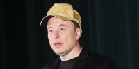 Image: Elon Musk Holds Town Hall With Pennslyvania Voters gold maga hat politics political