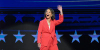 Lisa Blunt Rochester waves as she arrives onstage