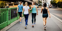 Fitness Group Cooling Down After City Run