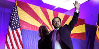 Rep. Ruben Gallego waves to supporters