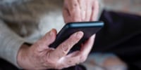 old woman using a smartphone.