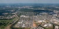 An aerial view of homes and businesses in Austin