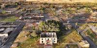 The remains of the Old Lahaina Courthouse, bottom center,  in Lahaina, Hawaii, on Aug. 4, 2024.